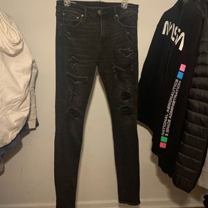 Distressed black denim